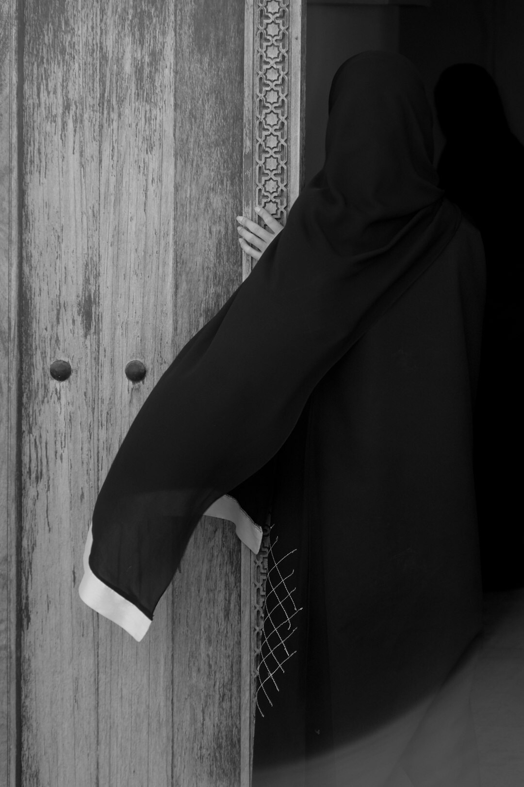 person opening mysterious door